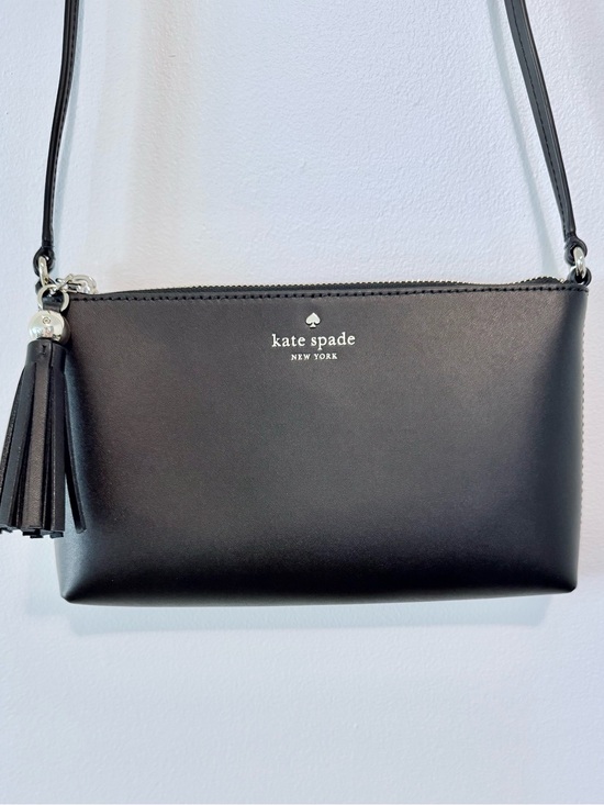 kate spade Handbags - kate Spade Black Leather Crossbody with Tassel Charm